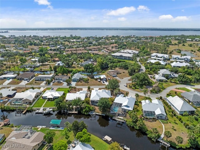 15461 River Cove Ct, North Fort Myers, FL 33917 - drone / aerial view with a water view and a residential view