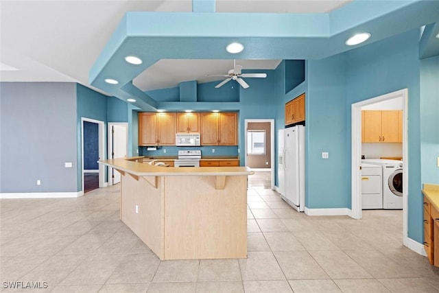 15461 River Cove Ct, North Fort Myers, FL 33917 - kitchen featuring a ceiling fan, recessed lighting, light tile patterned floors, white appliances, and washer and clothes dryer