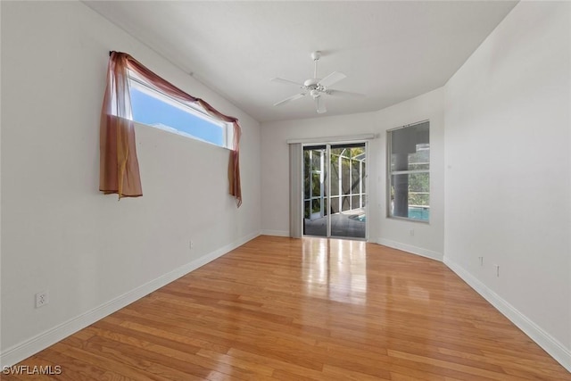 15461 River Cove Ct, North Fort Myers, FL 33917 - unfurnished room featuring light wood finished floors, baseboards, and ceiling fan