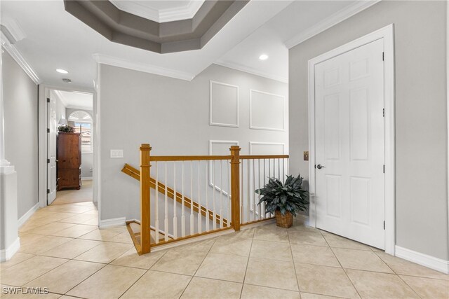 11239 Bienvenida Ct Unit 11C, Fort Myers, FL 33908 - hall with an upstairs landing, light tile patterned floors, ornamental molding, recessed lighting, and baseboards