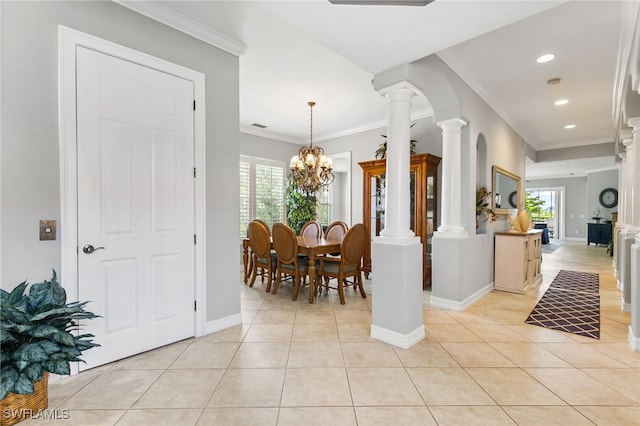 11239 Bienvenida Ct Unit 11C, Fort Myers, FL 33908 - dining area featuring ornate columns, light tile patterned flooring, ornamental molding, recessed lighting, and baseboards