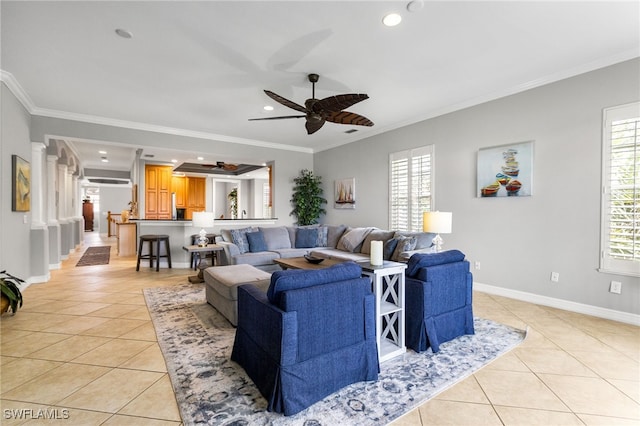 11239 Bienvenida Ct Unit 11C, Fort Myers, FL 33908 - living area featuring light tile patterned flooring, healthy amount of natural light, ceiling fan, crown molding, and recessed lighting