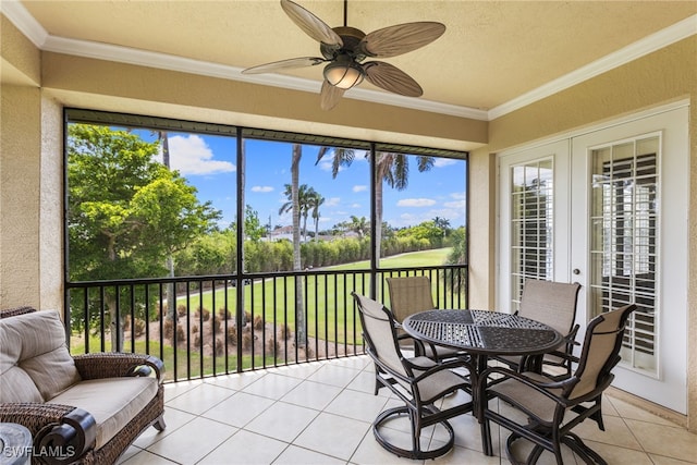 11239 Bienvenida Ct Unit 11C, Fort Myers, FL 33908 - sunroom / solarium featuring tile patterned flooring, ornamental molding, a textured wall, view of golf course, and a textured ceiling