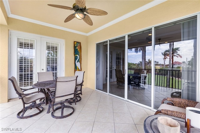 11239 Bienvenida Ct Unit 11C, Fort Myers, FL 33908 - sunroom / solarium with french doors, a ceiling fan, and outdoor dining space