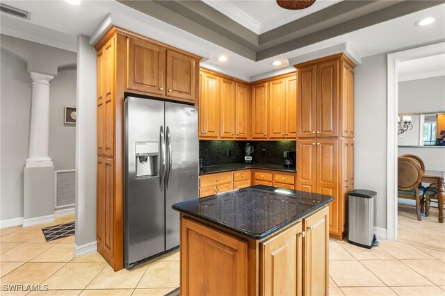 11239 Bienvenida Ct Unit 11C, Fort Myers, FL 33908 - kitchen featuring stainless steel fridge, ornamental molding, light tile patterned flooring, ornate columns, and recessed lighting