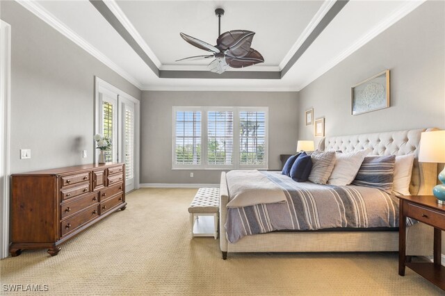 11239 Bienvenida Ct Unit 11C, Fort Myers, FL 33908 - bedroom with a raised ceiling, light colored carpet, ornamental molding, baseboards, and a ceiling fan