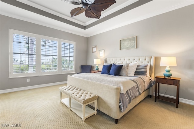 11239 Bienvenida Ct Unit 11C, Fort Myers, FL 33908 - bedroom with baseboards, a raised ceiling, light carpet, and ornamental molding
