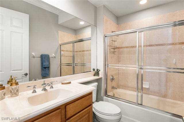 11239 Bienvenida Ct Unit 11C, Fort Myers, FL 33908 - bathroom featuring toilet, shower / bath combination with glass door, vanity, and recessed lighting