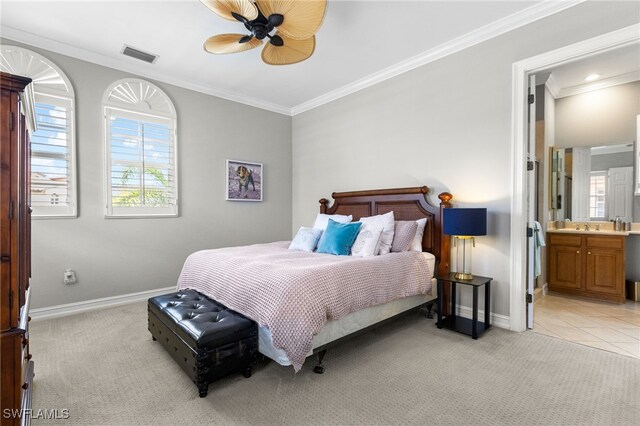 11239 Bienvenida Ct Unit 11C, Fort Myers, FL 33908 - bedroom featuring light colored carpet, baseboards, crown molding, ensuite bath, and a ceiling fan