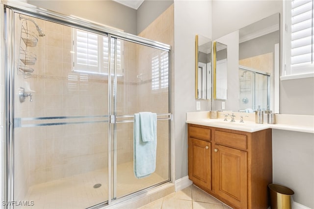 11239 Bienvenida Ct Unit 11C, Fort Myers, FL 33908 - bathroom featuring a shower stall, vanity, and tile patterned floors