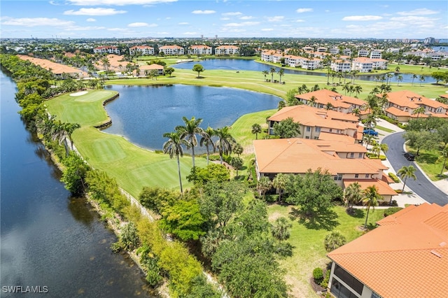 11239 Bienvenida Ct Unit 11C, Fort Myers, FL 33908 - aerial perspective of suburban area featuring a nearby body of water and a local golf course
