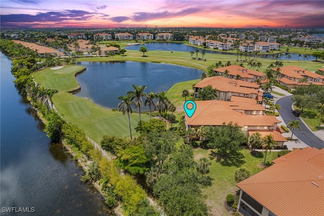 11239 Bienvenida Ct Unit 11C, Fort Myers, FL 33908 - aerial view at dusk of a water view, a residential view, and view of golf course