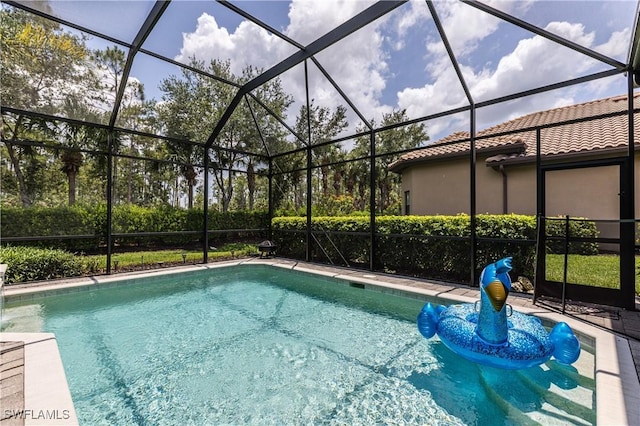 7307 Acorn Way, Naples, FL 34119 - swimming pool featuring glass enclosure