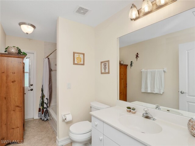201 SE 4th St, Cape Coral, FL 33990 - full bathroom with shower / bath combination with curtain, toilet, visible vents, tile patterned flooring, and vanity