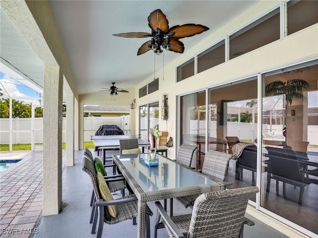 201 SE 4th St, Cape Coral, FL 33990 - view of patio with outdoor dining space, ceiling fan, and fence