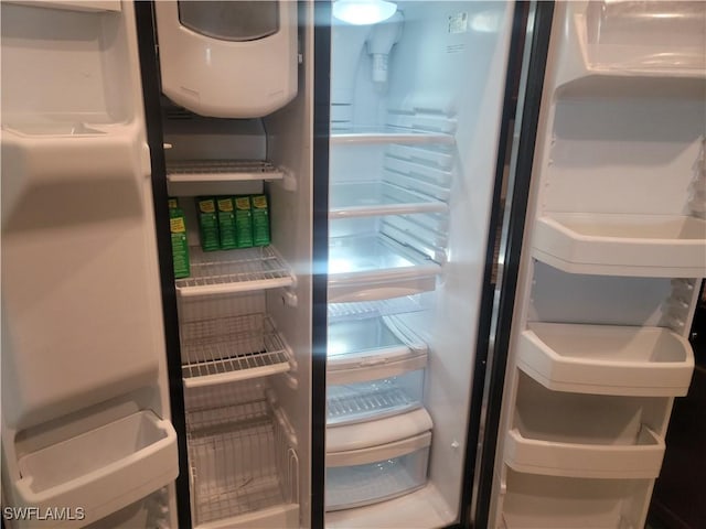 details featuring freestanding refrigerator
