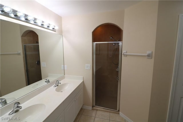 923 SW 35th St, Cape Coral, FL 33914 - bathroom featuring tile patterned flooring, a shower stall, and a sink