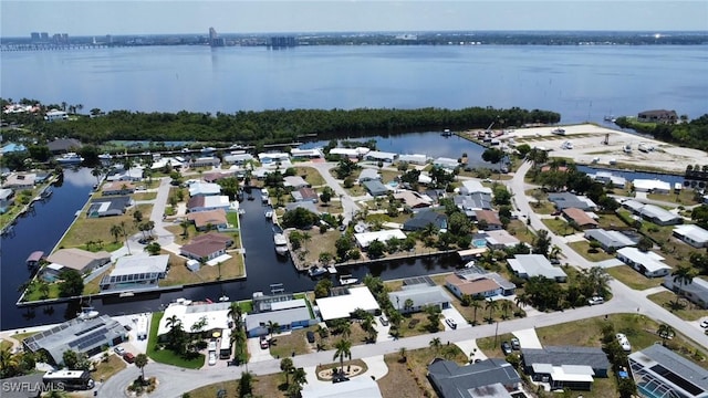 4318 S Pacific Cir, North Fort Myers, FL 33903 - bird's eye view with a water view and a residential view