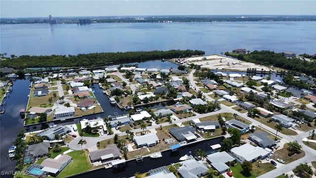 4318 S Pacific Cir, North Fort Myers, FL 33903 - bird's eye view with a water view and a residential view