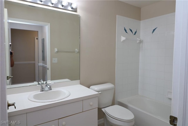 bathroom featuring bathtub / shower combination, toilet, and vanity