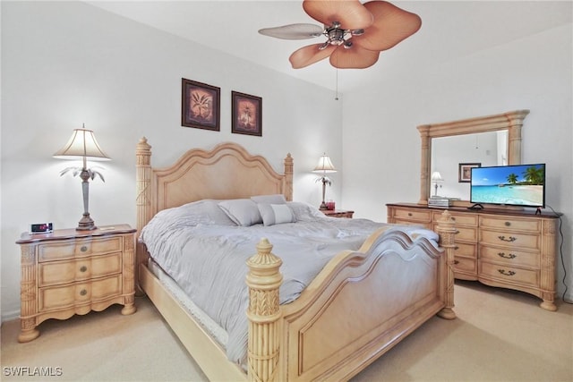bedroom with light colored carpet and ceiling fan