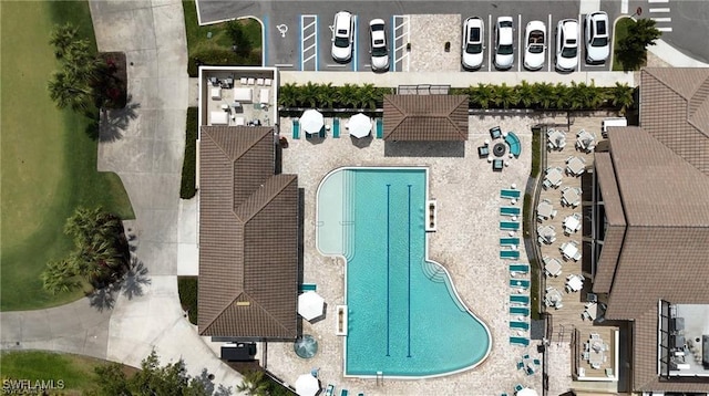 drone / aerial view of a pool