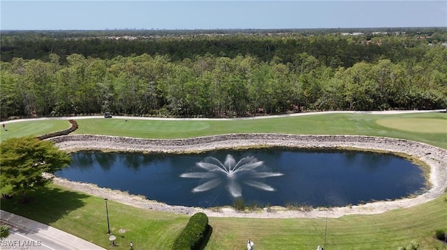 view of property's community with a water view, golf course view, and a view of trees