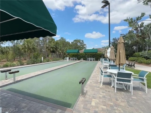 surrounding community featuring a bocce ball area