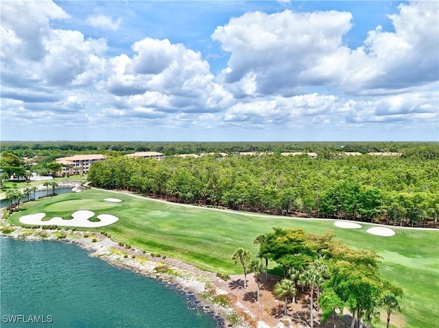 aerial view of a golf course and a nearby body of water