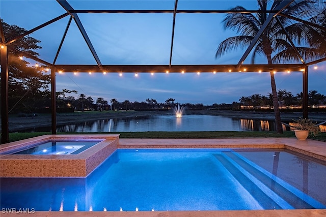 3599 Beaufort Ct, Naples, FL 34119 - outdoor pool featuring an in-ground hot tub, a water view, and glass enclosure