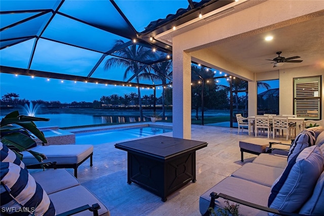3599 Beaufort Ct, Naples, FL 34119 - view of patio with an outdoor pool, an outdoor hangout area, outdoor dining space, a ceiling fan, and a lanai
