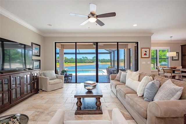 3599 Beaufort Ct, Naples, FL 34119 - living room featuring a ceiling fan, stone tile flooring, crown molding, and recessed lighting