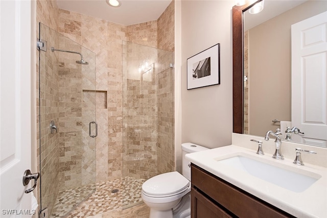3599 Beaufort Ct, Naples, FL 34119 - full bathroom with a shower stall, toilet, and vanity