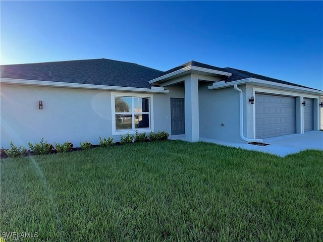 4334 SW 9th Pl, Cape Coral, FL 33914 - view of front of house with roof with shingles, concrete driveway, a garage, stucco siding, and a front yard