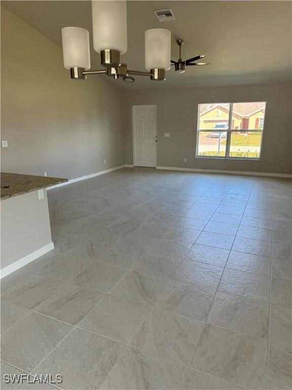 4334 SW 9th Pl, Cape Coral, FL 33914 - unfurnished room featuring a chandelier, baseboards, light tile patterned floors, and visible vents