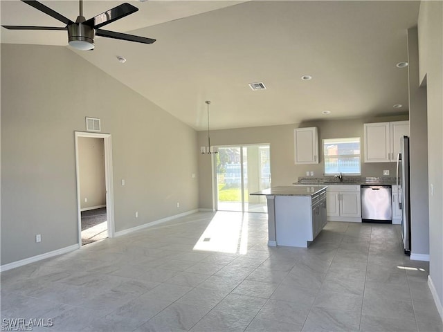 4334 SW 9th Pl, Cape Coral, FL 33914 - kitchen featuring stainless steel appliances, visible vents, ceiling fan, white cabinetry, and open floor plan