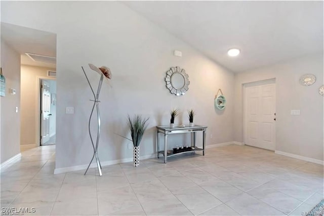 4334 SW 9th Pl, Cape Coral, FL 33914 - entryway featuring baseboards and light tile patterned flooring