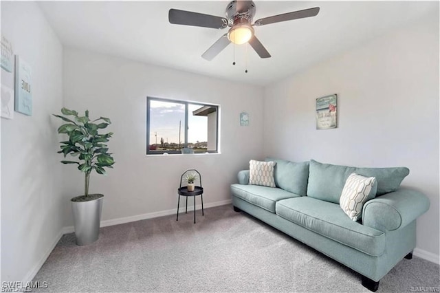 4334 SW 9th Pl, Cape Coral, FL 33914 - carpeted living room with baseboards and ceiling fan