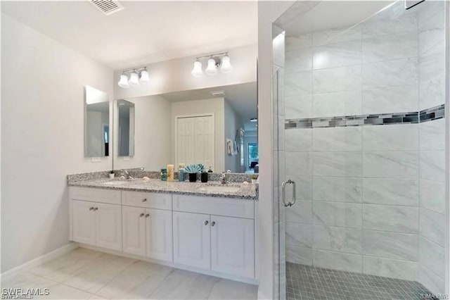 4334 SW 9th Pl, Cape Coral, FL 33914 - full bathroom featuring double vanity, baseboards, a shower stall, and a sink