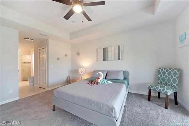 4334 SW 9th Pl, Cape Coral, FL 33914 - bedroom with a ceiling fan, a tray ceiling, baseboards, visible vents, and carpet floors