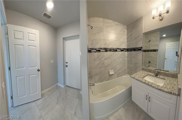 4334 SW 9th Pl, Cape Coral, FL 33914 - bathroom with shower / washtub combination, visible vents, baseboards, marble finish floor, and vanity