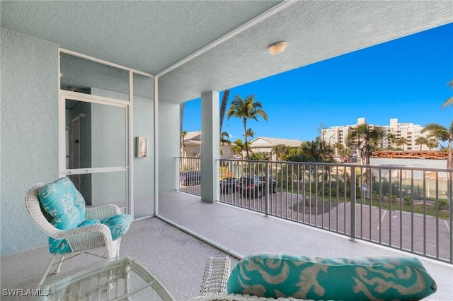 view of patio / terrace with a balcony