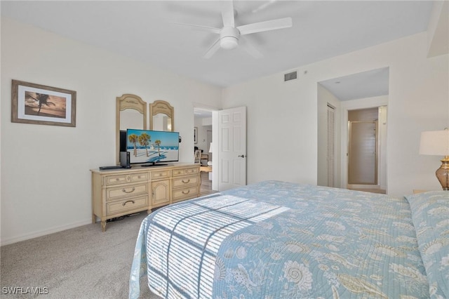 bedroom featuring light carpet, ceiling fan, and baseboards