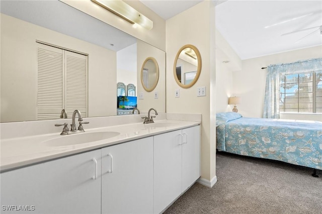 22748 Island Pines Way Unit 102, Fort Myers Beach, FL 33931 - ensuite bathroom with double vanity and carpet