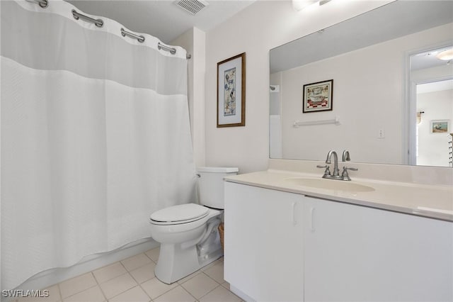 22748 Island Pines Way Unit 102, Fort Myers Beach, FL 33931 - full bathroom featuring tile patterned flooring, toilet, vanity, and shower / bathtub combination with curtain