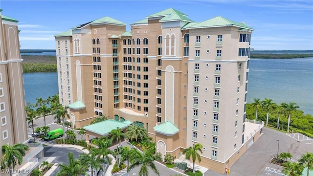 4137 Bay Beach Ln Unit 585, Fort Myers Beach, FL 33931 - view of building exterior featuring a water view