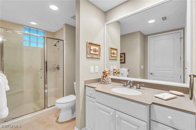 4137 Bay Beach Ln Unit 585, Fort Myers Beach, FL 33931 - full bathroom with toilet, tile patterned floors, visible vents, a shower stall, and vanity