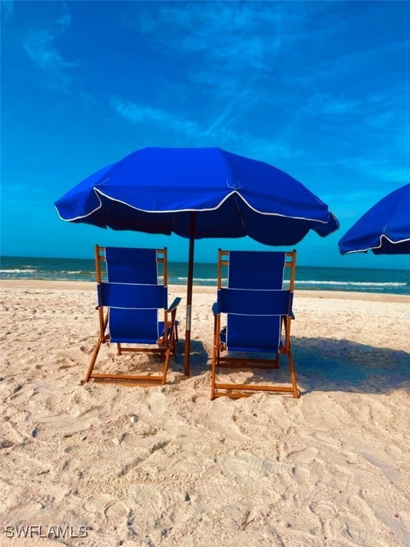 4137 Bay Beach Ln Unit 585, Fort Myers Beach, FL 33931 - exterior space featuring a water view and a beach view