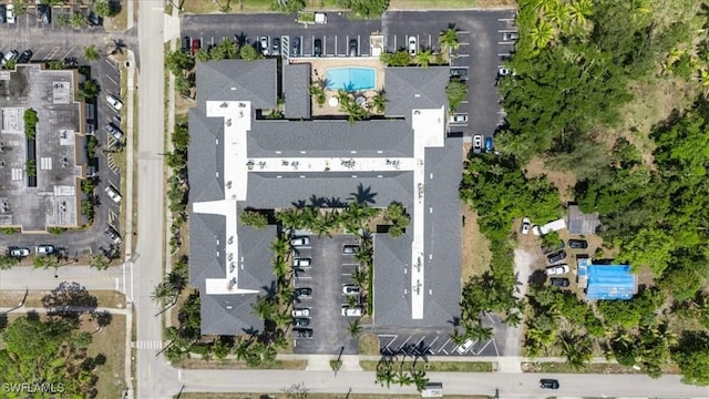 view of property location featuring a pool