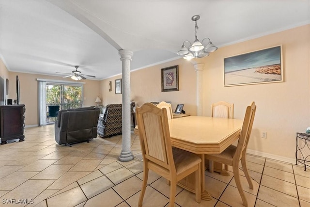 dining room featuring ornate columns, crown molding, light tile patterned floors, ceiling fan, and baseboards